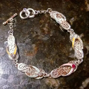 A really beautiful ladies bracelet size small...one of a kind ..Smoke-free home.